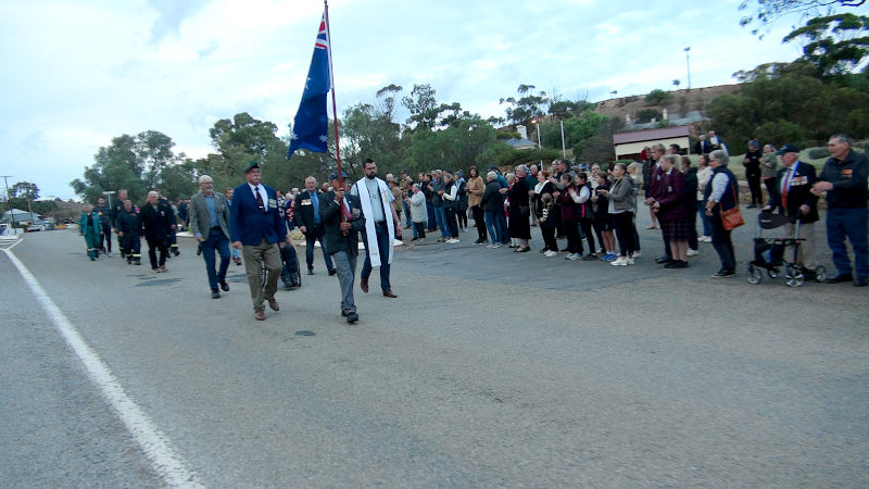 ANZAC March past applauding Crowd