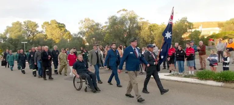 Marching Past Applauding Crowd